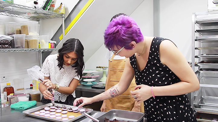 The colorful girls try for a day french macarons